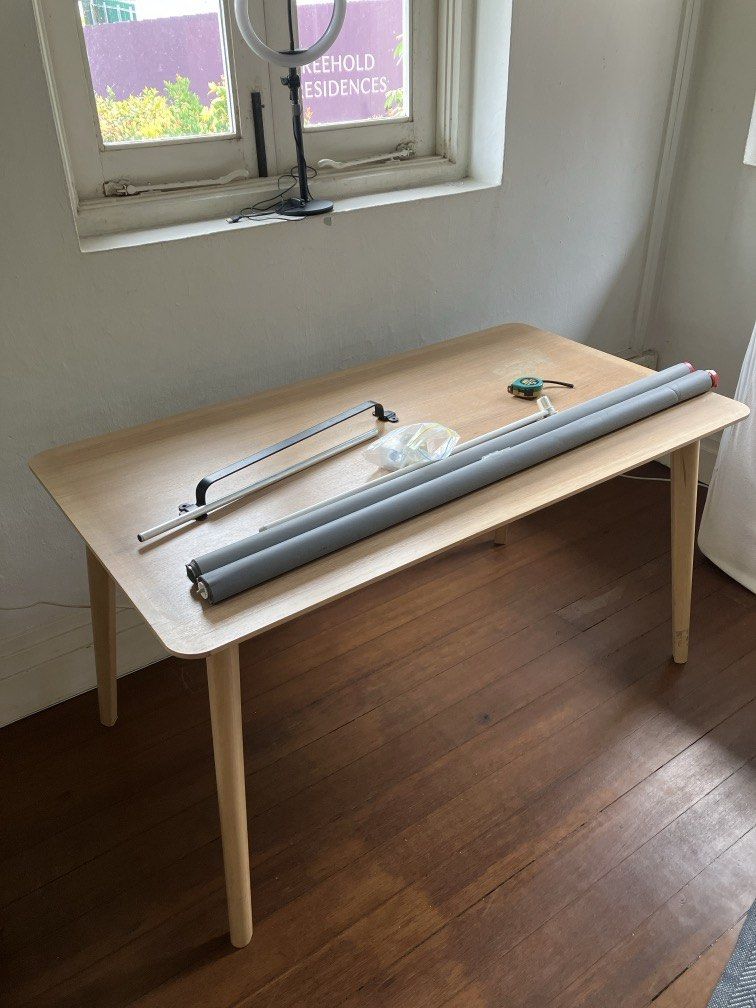 Ikea table dining desk computer study table (Category: Tables & Sets) located in Singapore. Submitted by n0bby (Listing ID 1440774464, Image 1). Description: Can flat pack for you. 140x78 cm 74cm high See pic for sun bleaching on edge and water damage on surface Make me an offer on two.