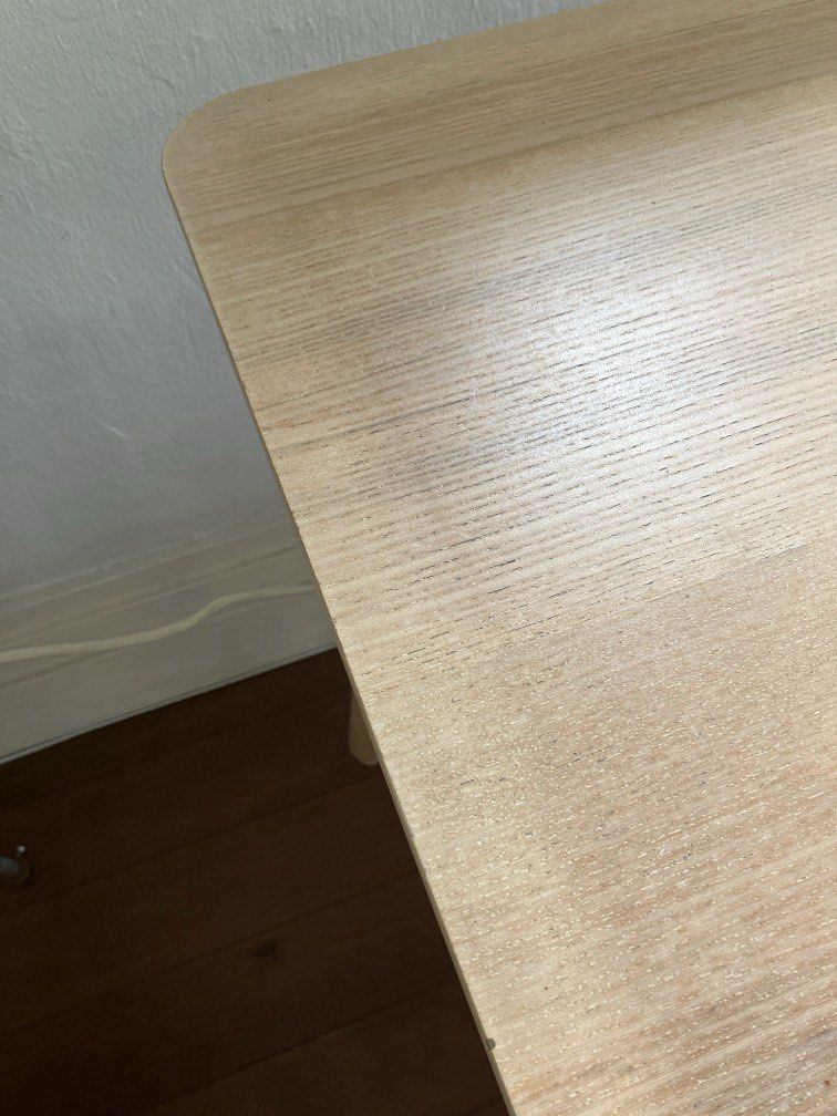 Ikea table dining desk computer study table (Category: Tables & Sets) located in Singapore. Submitted by n0bby (Listing ID 1440774464, Image 2). Description: Can flat pack for you. 140x78 cm 74cm high See pic for sun bleaching on edge and water damage on surface Make me an offer on two.