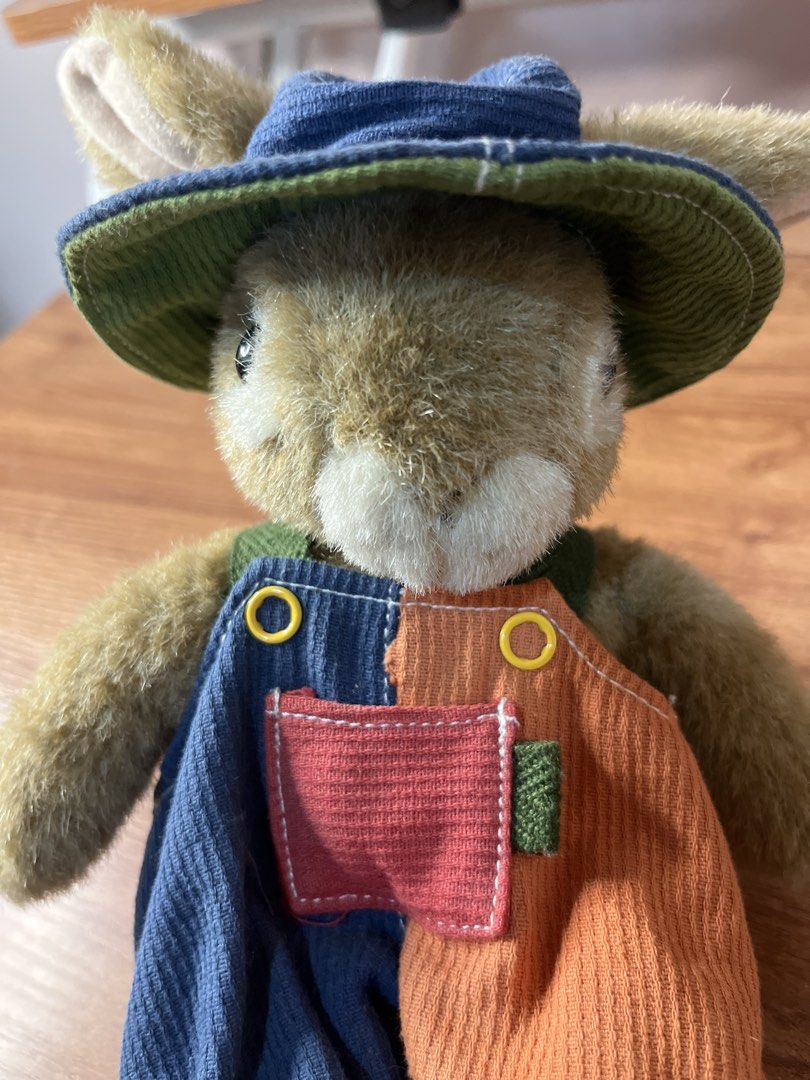 Japan Cute Bunny Plush Toy in Overalls and Hat (Category: Toys & Games) located in Gapan. Submitted by lunashop14 (Listing ID 1440807928, Image 3). Description: - Adorable bunny plush toy - Features a blue hat with a green brim - Wears colorful patchwork overalls (blue & orange corduroy) - Overalls have a cute red pocket detail - Ideal for collectors or as a charming gift.