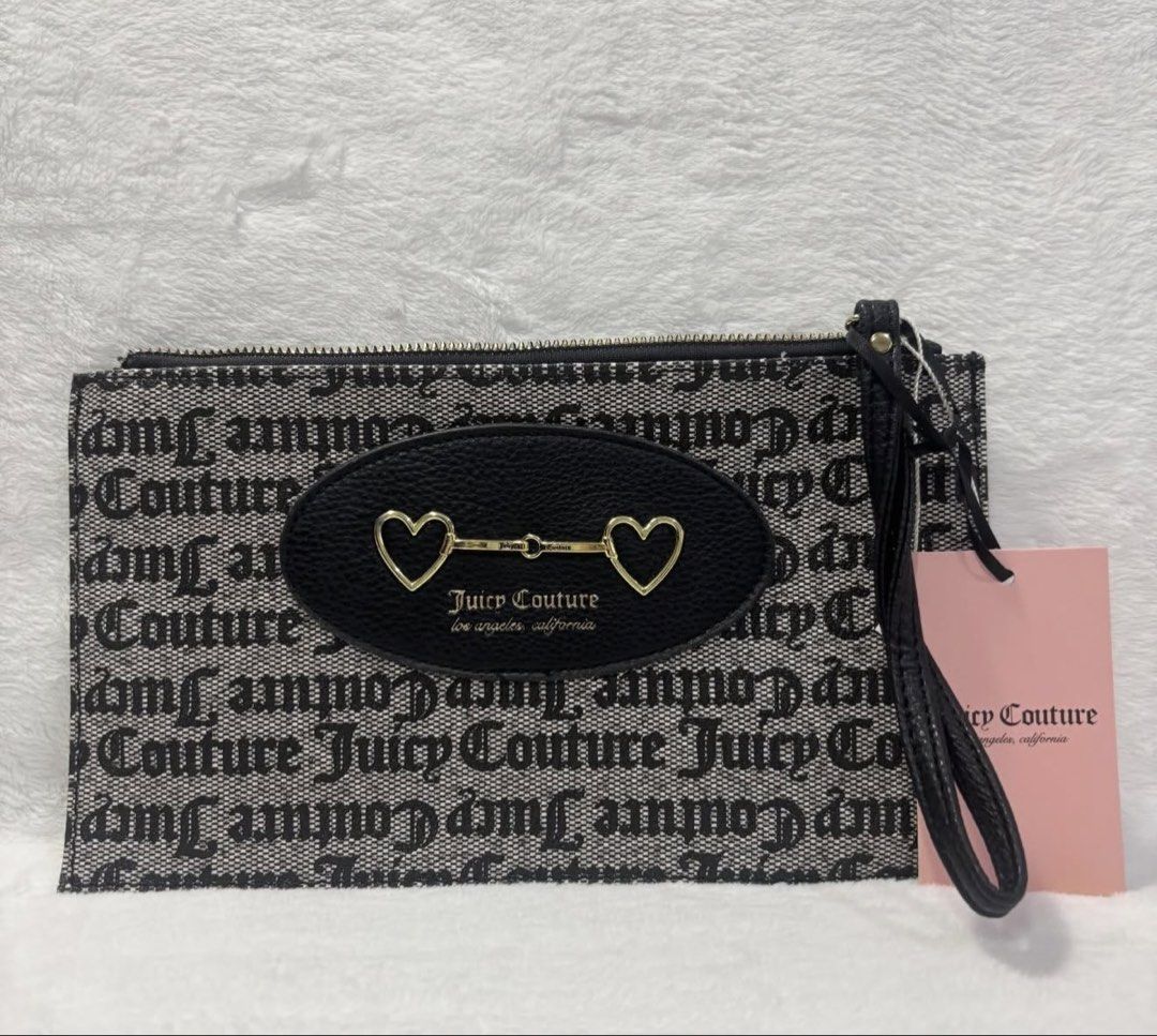 Juicy Couture Pouch Wristlet Black Grey Monogram (Category: Purses & Pouches) located in Mandaluyong City. Submitted by isydln (Listing ID 1440822495, Image 1). Description: - Authentic Juicy Couture wristlet pouch - Classic black and grey monogram print - Features a black oval patch with gold heart details and Juicy Couture logo - Secure zipper closure - Multiple card slots inside for organization - Comes with original tag, brand new.
