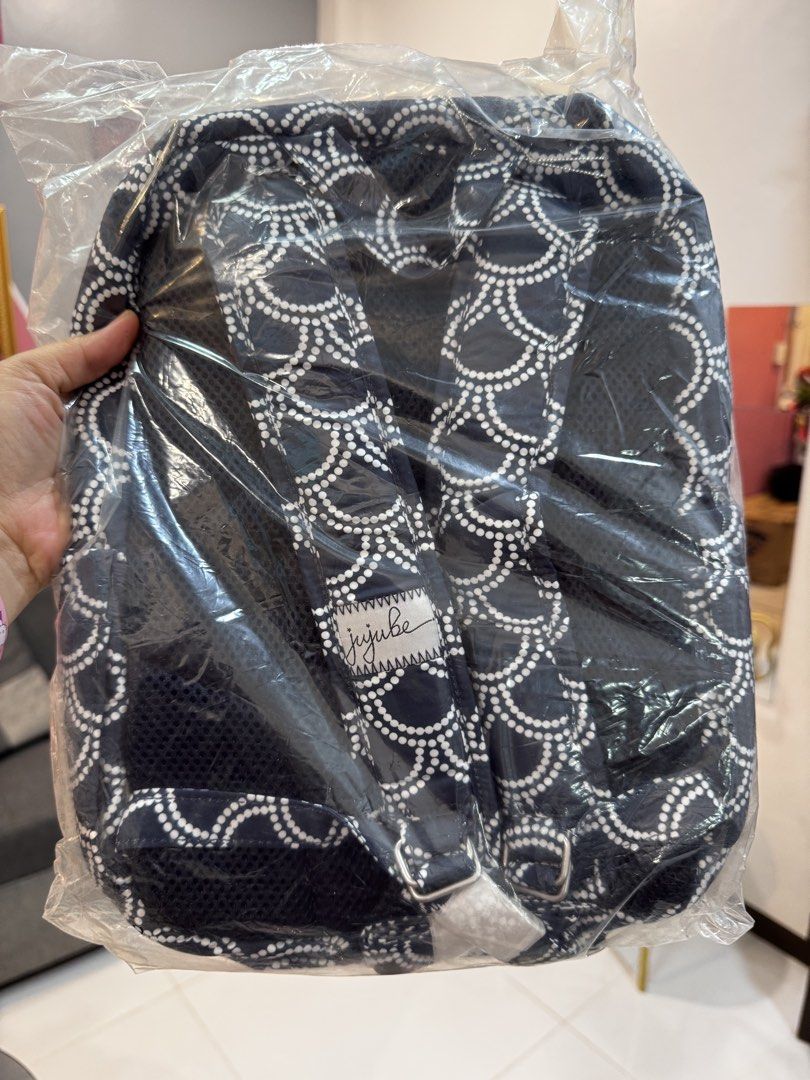 Ju-Ju-Be Be Minibe Backpack - Mermaid Scale Print (Category: Backpacks) located in Dagupan City. Submitted by francesco11 (Listing ID 1440769067, Image 2). Description: - Ju-Ju-Be minibe backpack - Features a cute mermaid scale print - Color: Dark navy with white pattern - Brand new, still in original packaging - Ideal for everyday use or travel.