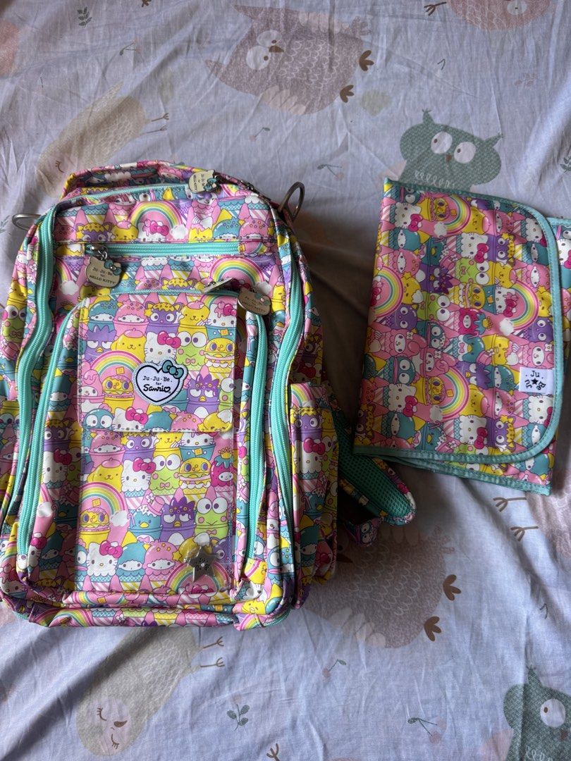 Ju-Ju-Be BRB Hello Kitty Backpack with Changing Pad (Category: Diaper Bags & Wetbags) located in Dagupan City. Submitted by francesco11 (Listing ID 1440767352, Image 1). Description: - Adorable Ju-Ju-Be diaper bag backpack featuring Kitty & Sanrio characters. - Comes with a matching changing pad for convenience. - Multiple pockets designed for excellent organization. - Padded shoulder straps ensure comfortable carrying. - Ideal for parents who ar