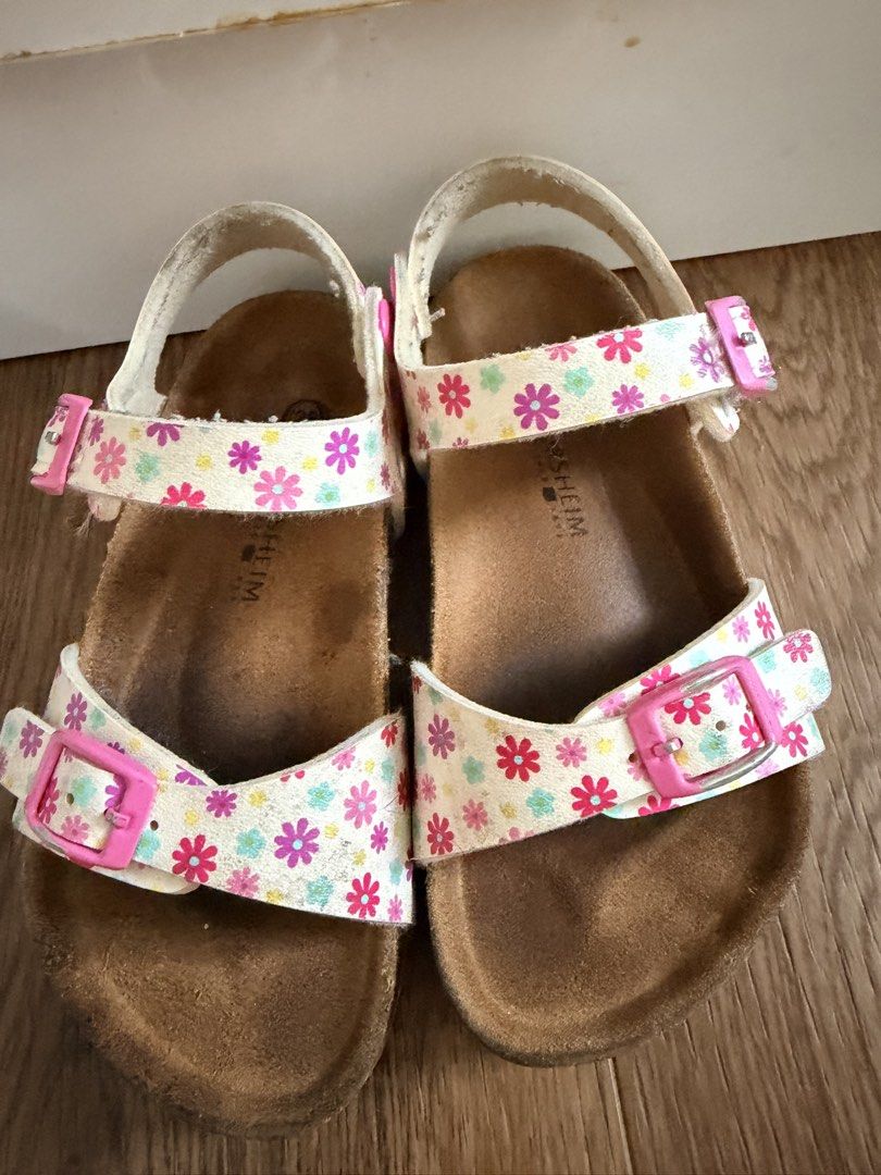 Kids Floral Cork Sandals with Pink Buckles (Category: Babies & Kids Fashion) located in Paranaque City. Submitted by msl_crux26 (Listing ID 1440824056, Image 1). Description: - Adorable white sandals with vibrant floral print straps. - Secure and adjustable pink buckles. - Comfortable cork footbed for all-day wear. - Ideal for summer adventures. - Shows slight signs of wear on footbed and straps. - size 28.