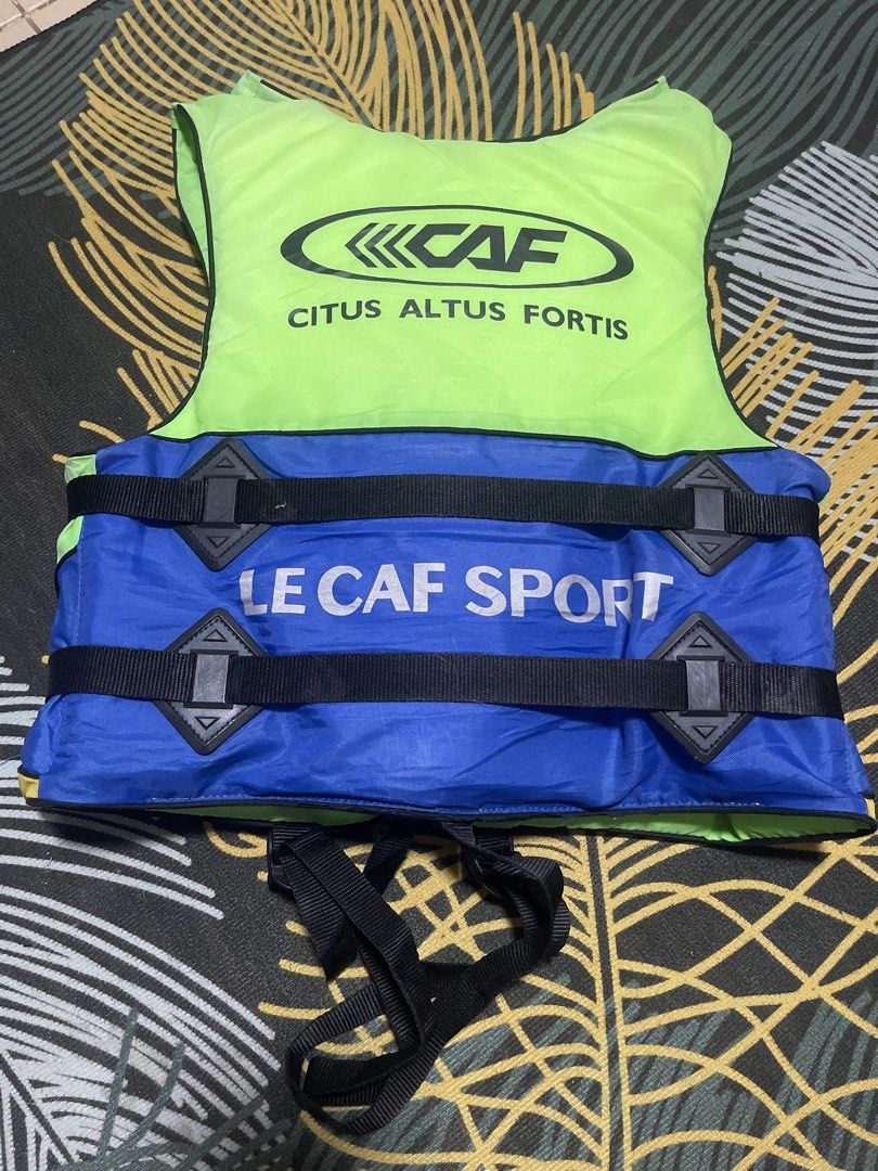 LE CAF SPORT Life Vest Jacket (Category: Vests) located in Davao. Submitted by rcgulanes.moon (Listing ID 1440896269, Image 3). Description: - LE CAF SPORT life vest - Vibrant colors: Bright lime green, blue, and yellow - Multiple adjustable straps with buckles for a secure and customizable fit - Perfect for water sports and boating activities - Ensures safety on the water.