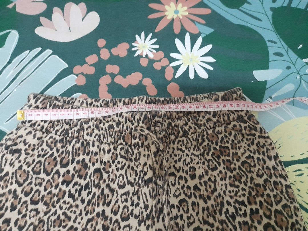Leopard Print Hoodie and Pants Set (Category: Sets or Coordinates) located in Quezon City. Submitted by chessymode (Listing ID 1440764961, Image 2). Description: - Stylish leopard print hoodie and matching pants set. - Hoodie features a drawstring hood and long sleeves. - Pants have a comfortable elastic waistband. - Ideal for lounging at home or casual outings. - Check photos for more details..
