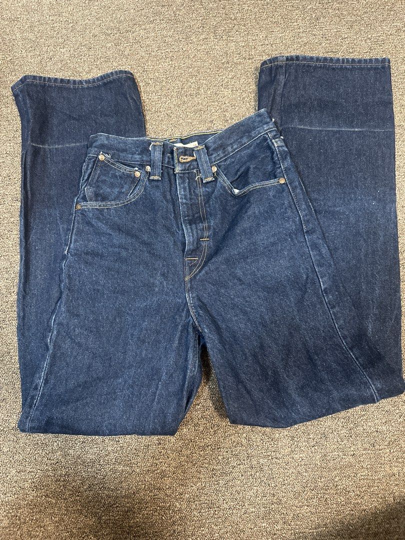 Levi's Red High Loose Jeans Size 24 (Category: Jeans) located in Mandaluyong City. Submitted by krstls (Listing ID 1440819399, Image 1). Description: - Dark wash Levi's jeans - High waist, loose fit - Size 24 - Light stain on lower leg (visible in last photo).