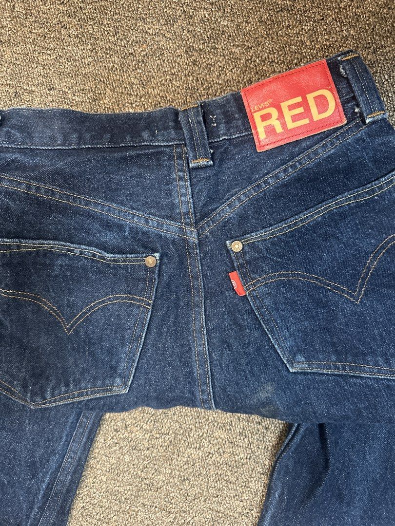Levi's Red High Loose Jeans Size 24 (Category: Jeans) located in Mandaluyong City. Submitted by krstls (Listing ID 1440819399, Image 3). Description: - Dark wash Levi's jeans - High waist, loose fit - Size 24 - Light stain on lower leg (visible in last photo).