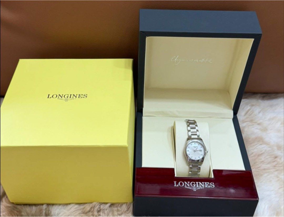 Longines Watch (Category: Luxury Watches) located in Quezon City. Submitted by liezl.marie (Listing ID 1440849396, Image 1). Description: L0ng!nes Conquest Classic stainless steel ladies’ watch with a white mother-of-pearl dial and diamond markers. 39,800 Open for layaway. Disclaimer: We are not affiliated, associated, authorized, endorsed by or in any way officially connected with any other company or luxury brand. All copyrights are reserved to
