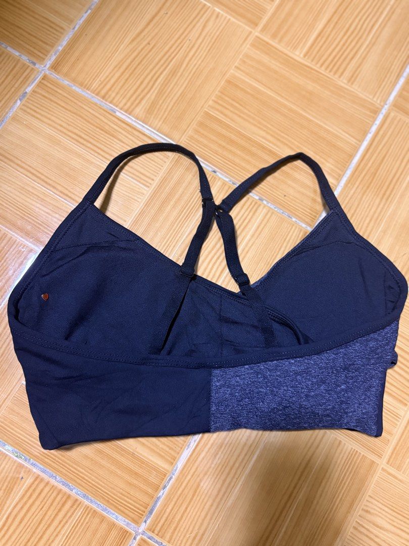 Lorraine Active Sports Bra (Category: Activewear) located in Paete. Submitted by skydruemadison (Listing ID 1440898363, Image 2). Description: - Lorraine Active sports bra - Stylish wrap front design - Criss-cross straps at the back - Dark navy and grey marl colorway - Perfect for medium impact workouts - Provides comfort and support xs-s.
