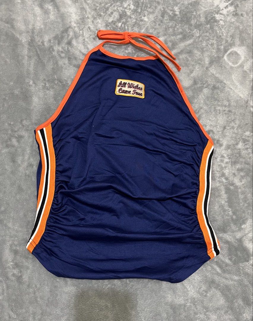 Lovito Navy Blue Halter Top with Orange Trim - Size Medium (Category: Sleeveless) located in Manila. Submitted by diannecofino (Listing ID 1440783025, Image 2). Description: - Brand: Lovito - Color: Navy Blue - Size: Medium - Bust: 28-36 inches - Length: 21 inches - Features: "All Wishes Came True" patch, orange and white side trim, ruched sides - Closure: Ties at the neck.