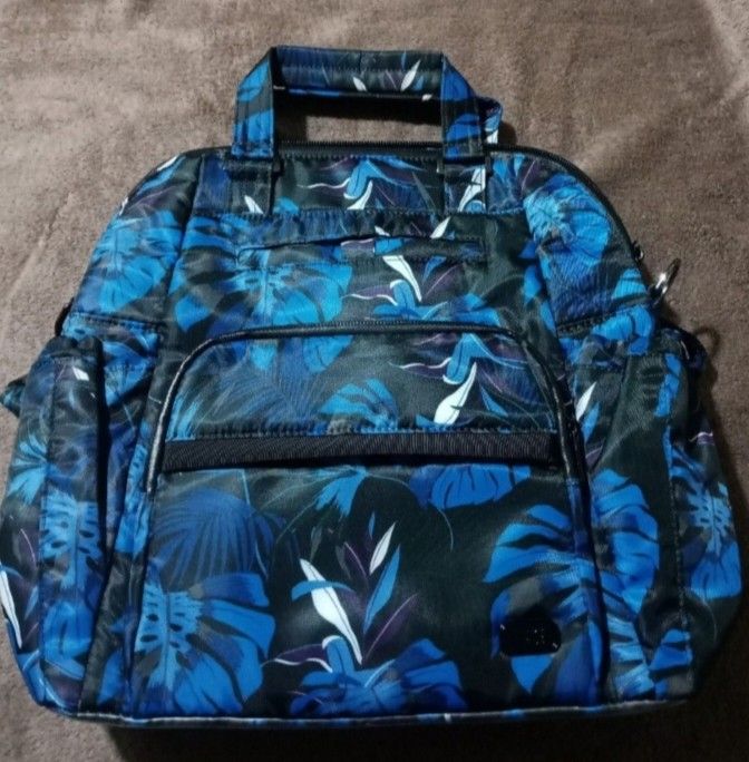 Lug Canter Convertible Shoulder/ Tote Bag (Category: Shoulder Bags) located in Manila. Submitted by rnursecoast08 (Listing ID 1440768989, Image 3). Description: Lug Canter Convertible Tote Bag Dimension: 10.5" W x 12.5"H x 5" D Weight: 1.44 lb Strap length: 29" to 56" Shoulder/ Strap Drop: 10" to 24" Handle Drop: 3" Backpack Strap: 19" to 32" Backpack Strap Drop: 10" to 16" Strap Width: 1.5" Exterior Features: One front soft lined slip pocket wit