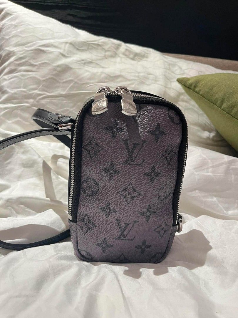 LV ECLIPSE CANVAS (Category: Luxury Bags & Wallets) located in Manila. Submitted by rhian_1994 (Listing ID 1440948802, Image 1). Description: Monogram Eclipse Reverse Double Phone Pouch..