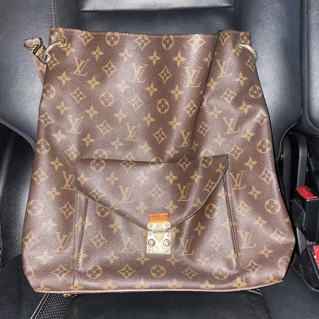 LV Metis Hobo (Category: Luxury Bags & Wallets) located in Davao. Submitted by luckybird3 (Listing ID 1440876091, Image 1). Description: Bought in a curated shop that sells luxury bags Well used (see pictures) 📍Davao City Shipping is to be shouldered by the buyer.