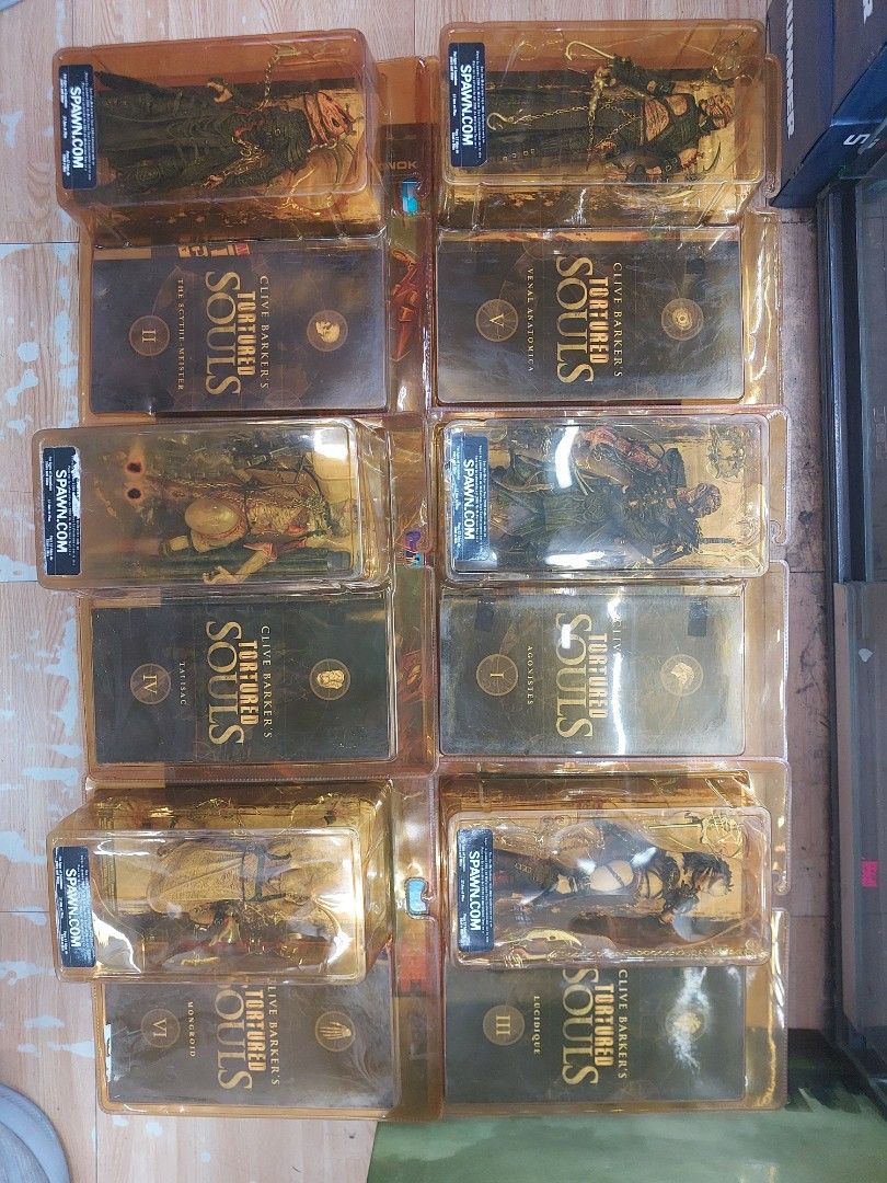 McFarlane Clive Barker's Tortured Souls Action Figures Complete Set (Category: Figurines & Statues) located in Manila. Submitted by robinshobbyshopph (Listing ID 1440860571, Image 2). Description: - Complete set of all 6 Clive Barker's Tortured Souls action figures. - All figures are brand new and sealed in their original packaging. - Packaging shows minor shelf wear, but figures themselves are in pristine condition. - A rare and highly sought-af