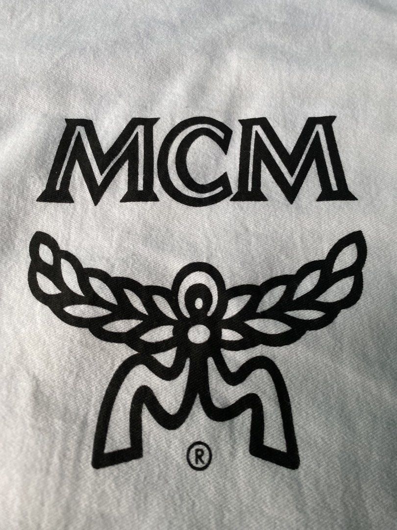 MCM Dust Bag (Category: Luxury Bags & Wallets) located in Cebu City. Submitted by nardcen (Listing ID 1440791327, Image 3). Description: - Authentic MCM dust bag - Features iconic MCM logo - Dimensions: Approximately 20 inches x 18 inches - Perfect for storing handbags, shoes, or other valuables.