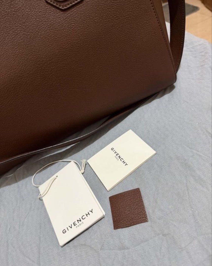 Medium Givenchy Antigona Leather Handbag (Category: Luxury Bags & Wallets) located in Quezon City. Submitted by u.s_cleancloset (Listing ID 1440881339, Image 3). Description: - Authentic Givenchy Antigona bag - Color: Brown leather - Hardware: Silver - Features: Top handles and detachable shoulder strap - Includes: Dust bag, authenticity cards, and leather swatch - Ideal for: Everyday use.