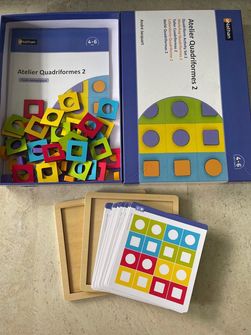 Nathan Atelier Quadriformes 2 Educational Activity Set (Category: Toys & Games) located in Singapore. Submitted by mayeee0505 (Listing ID 1440771578, Image 1). Description: - Nathan Atelier Quadriformes 2 - Set includes wooden shapes and activity cards - Suitable for children aged 4-6 years - Helps children learn shapes and patterns - Comes with wooden pieces, activity cards, and wooden frames - Fun and educational toy for young children Self col