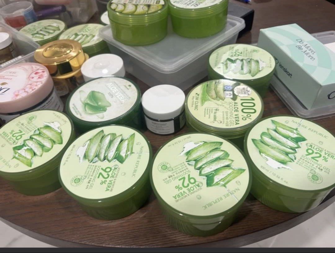 Empty containers (Category: Face Care) located in Singapore. Submitted by jodiestrawberry (Listing ID 1440873722, Image 2). Description: - Bundle includes Nature Republic Aloe Vera 92% Soothing Gels. - Also includes assorted skincare items: Dove products, G-Shock watch tin, John Jacobs box. - Condition varies: some items are full, others are partially used. - Ideal for replenishing your supply of the popular Aloe Vera Soothing Gel. - Great value 