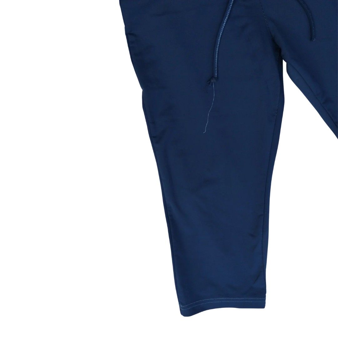 Navy Blue Sports Pants with Drawstring | Large [Nego] (Category: Other Bottoms) located in Manila. Submitted by ubes_corner (Listing ID 1440939455, Image 3). Description: *OPEN TO NEGOTIATION* - Navy blue capri-length sports pants - Elastic waistband with adjustable drawstring - Small embroidered logo on lower right leg - Comfortable for workouts and casual wear - Ideal for badminton and general sports.