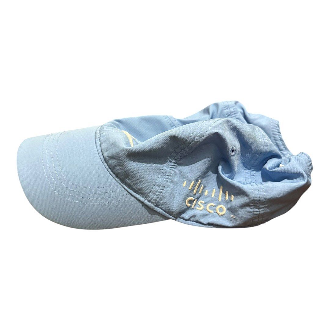 Nike Performance Baseball Cap Light Blue Cisco Corporate Branding Adjustable (Category: Caps & Hats) located in Paranaque City. Submitted by thepopneverstops (Listing ID 1440920634, Image 3). Description: Condition Rating: 7/10. This is a well-loved, lightweight performance hat in a soft light blue shade. The fabric shows minor signs of previous use, including some light fading or discoloration, which is reflected in the price. It remains fully f