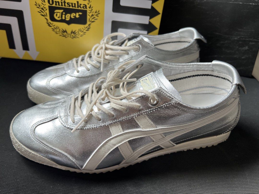 Onitsuka Tiger Mexico 66 Silver Metallic Sneakers (Category: Sneakers) located in Singapore. Submitted by apple_0000 (Listing ID 1440842480, Image 2). Description: Onitsuka Tiger Mexico 66 - Color: Silver/OFF WHITE - Size: US Unisex 8 / US Women’s 9.5 / UK 7 / EUR 41.5 / CM 26.0 - Original box & bag included - Received as a present 🎁 and try it once, Size small, Reselling it to buy one size bigger. Silver metallic color is really pretty when you