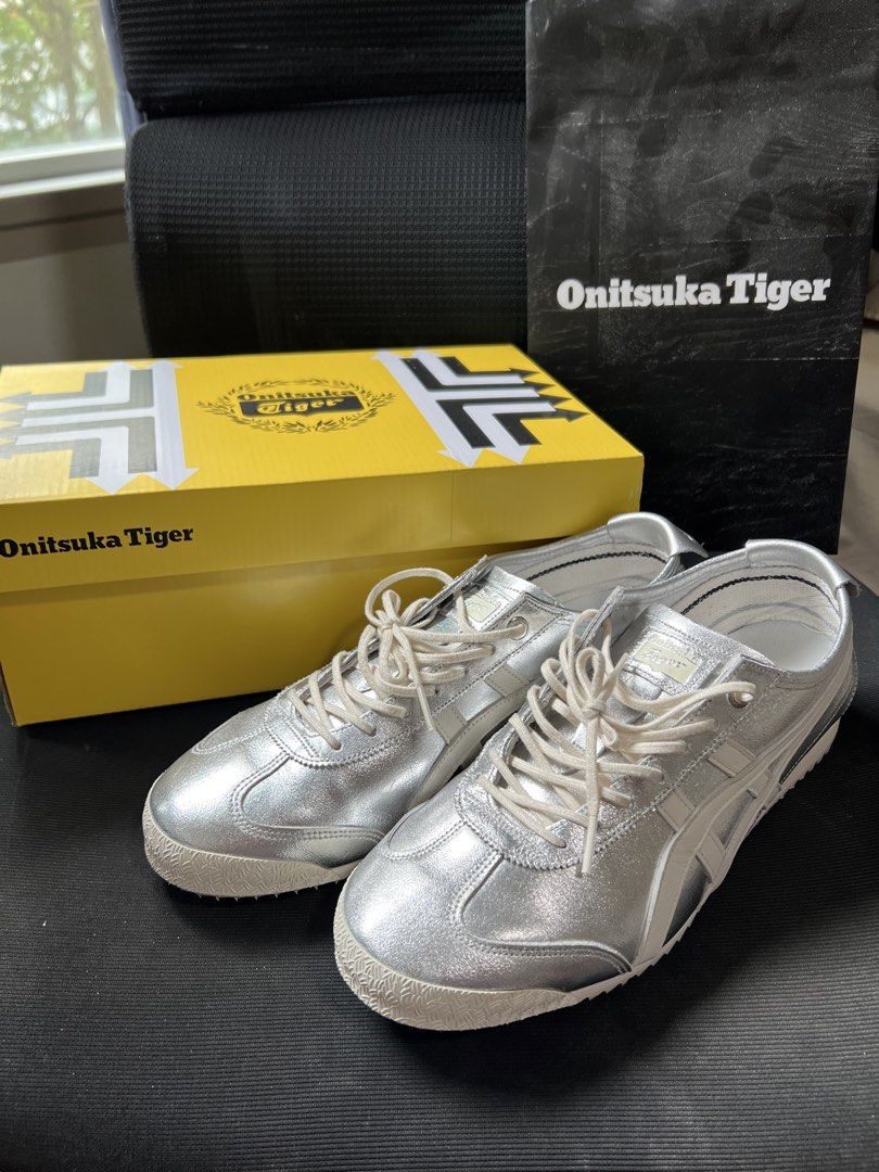 Onitsuka Tiger Mexico 66 Silver Metallic Sneakers (Category: Sneakers) located in Singapore. Submitted by apple_0000 (Listing ID 1440842480, Image 3). Description: Onitsuka Tiger Mexico 66 - Color: Silver/OFF WHITE - Size: US Unisex 8 / US Women’s 9.5 / UK 7 / EUR 41.5 / CM 26.0 - Original box & bag included - Received as a present 🎁 and try it once, Size small, Reselling it to buy one size bigger. Silver metallic color is really pretty when you