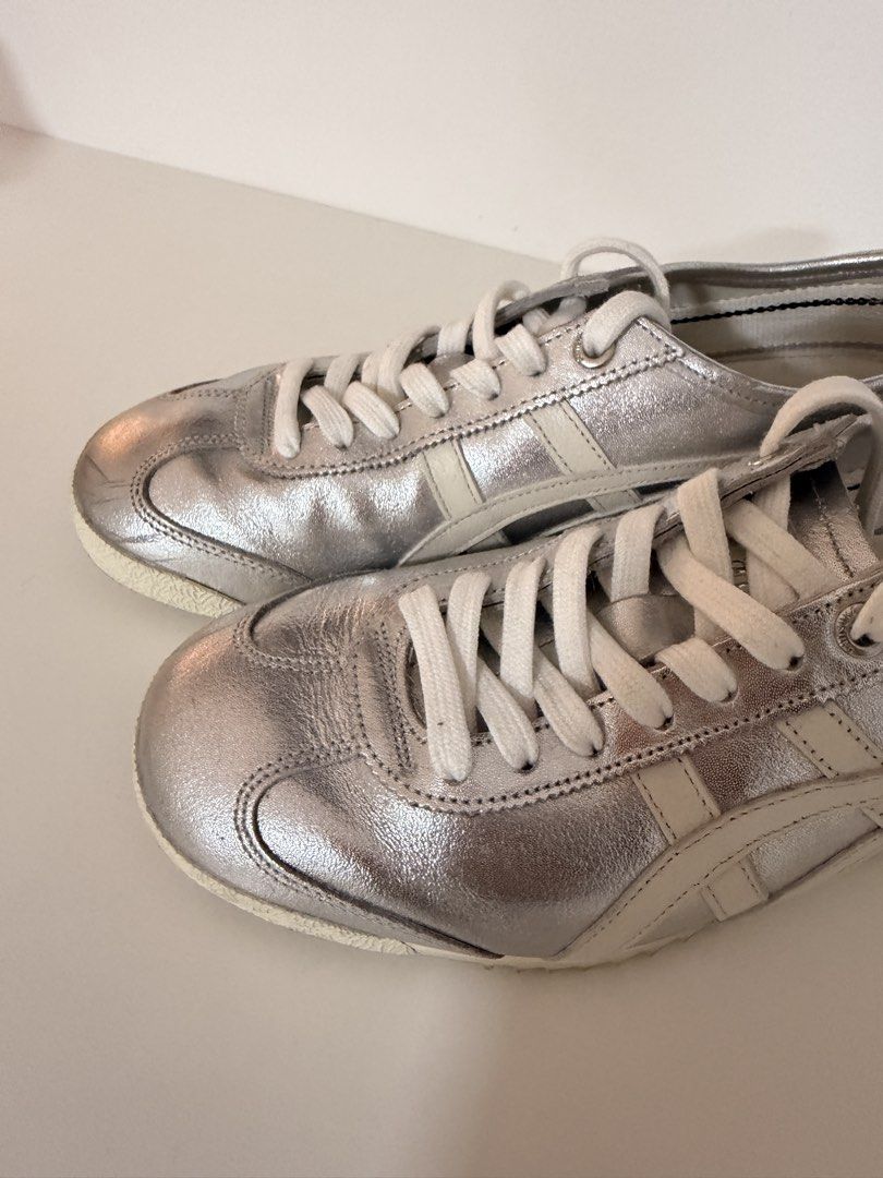 ONITSUKA TIGER MEXICO 66 "Silver Off White" sneakers (Category: Sneakers) located in Manila. Submitted by rienarri (Listing ID 1440947579, Image 2). Description: Onitsuka Tiger Mexico 66 "Silver Off White" Authentic Onitsuka Tiger sneakers in the sought-after Silver Off White colorway. • Good used condition • Metallic silver leather upper • Comfortable and lightweight • Classic Mexico 66 silhouette.