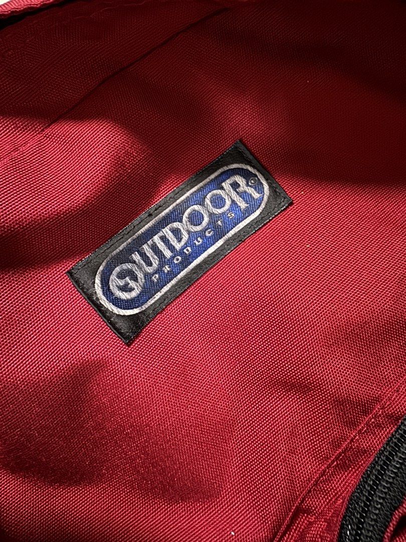 Outdoor Products Red Backpack Made in USA (Category: Backpacks) located in Manila. Submitted by grindnthrift (Listing ID 1440805979, Image 3). Description: - Classic red backpack from Outdoor Products - Made in the USA - Multiple zippered pockets for organization - Drawstring closure on one compartment - Durable material, built to last - Perfect for everyday use or travel adventures.