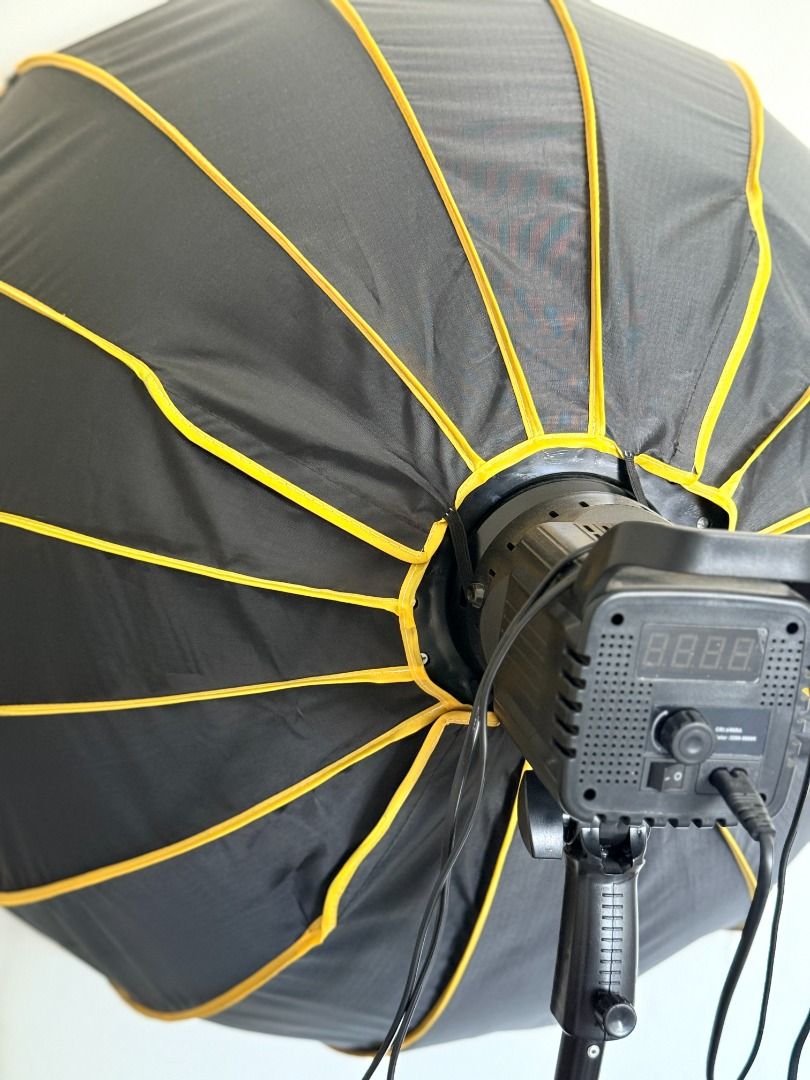 Parabolic Softbox With Grid Bowen Mount Honeycomb 90cm SET (Category: Lighting & Studio Equipment) located in Antipolo. Submitted by jenidee.merchandise (Listing ID 1440778872, Image 3). Description: Parabolic Softbox With Grid Bowen Mount Honeycomb 90cm SET LIKE NEW - seldom used Reason For Selling: Decluttering INCLUDED: 90cm softbox reflector light stand 300w fill light Purchase / Original Price: Php6,000 Selling Price: Php3,500 .