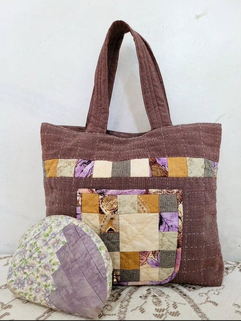 Patchwork Quilt Bundle Set (Category: Tote Bags) located in Balanga. Submitted by marae_c (Listing ID 1440948003, Image 1). Description: In verg good condition. Has few minimal storage stains as seen sa pics. Still very pretty and very useable. May front pouch pocket yung handbag, velco closure.. Makapal and sturdy handy bag for your everyday. Perfect for cottagecore whimsy fits. Measuremnts Handbag: length: 13 2" / height:11" (excluding handle s
