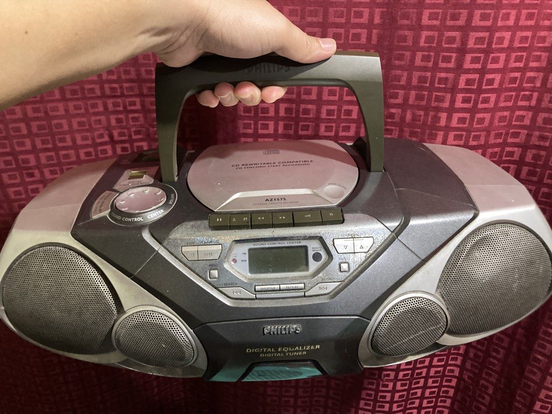Philips AZ1575 portable CD Soundmachine (boombox) (Category: Other Audio Equipment) located in Quezon City. Submitted by raynapucao (Listing ID 1440927468, Image 1). Description: The Philips AZ1575/11 is a classic, portable CD Soundmachine (boombox) 2001 Edition NOTE: with power Inclusion:Cord Only Defect/ISSUE CD player Casette player (Belt) On/off button- grounded For Repair- What you see is what you get SF will be shouldered by the buyer.