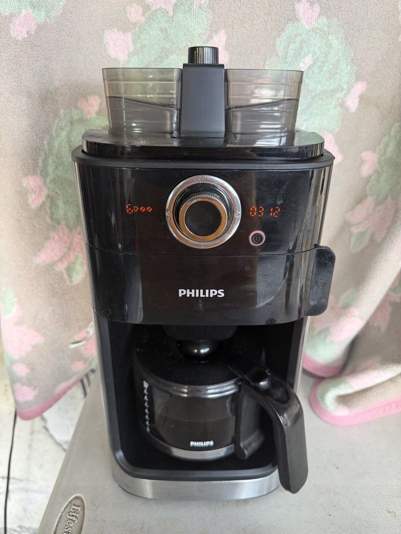 Philips Grind and Brew Coffee Maker (Category: Coffee Machines & Makers) located in Bulacan. Submitted by mysticdeer.6d7f47 (Listing ID 1440947409, Image 1). Description: Philips 2 in 1 Grind and Brew Coffee Maker 220V 10 cups capacity Issue: Missing lid cover for coffee bean. .