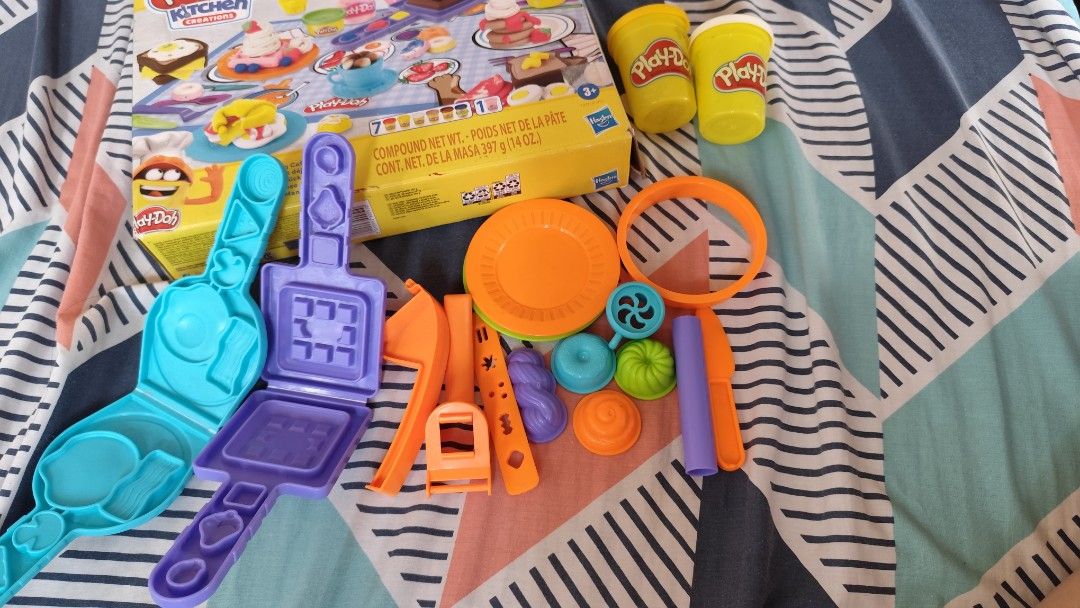 Play-Doh Kitchen Creations Morning Cafe Playset (Category: Kids Toys) located in Quezon City. Submitted by azenthings (Listing ID 1440837931, Image 3). Description: - Play-Doh Kitchen Creations Morning Cafe playset - Includes waffle maker and various molds - Encourages imaginative play and creating pretend treats - Provides hours of creative fun for kids Note: Clay not included location near SM fairview QC .