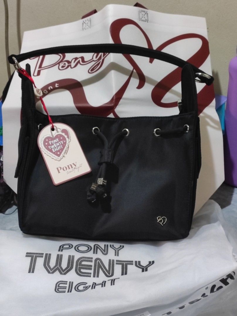 Pony Mini Deco Nylon (Category: Shoulder Bags) located in Navotas City. Submitted by sellmystuff2 (Listing ID 1440909558, Image 1). Description: ✅Brandnew with tags ✅Complete inclusions 💜Dust bag 💜 Eco bag 💜 Long strap ✅Nylon Fabric.