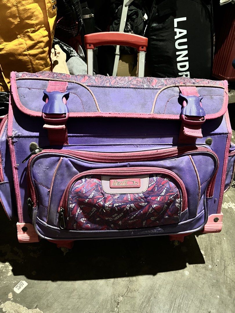 Purple Hawk Rolling Backpack with Pink Accents (Category: Backpacks) located in Santa Rosa. Submitted by cookienau (Listing ID 1440910220, Image 1). Description: hawk bag all working zippers, locks, wheels.