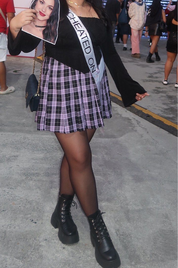 Purple Plaid Pleated Mini Skirt (Category: Skirts) located in Quezon City. Submitted by deahswardrobe (Listing ID 1440949648, Image 2). Description: - Cute purple and black plaid pleated mini skirt - Features a raw hem detail - Estimated size: Small to Medium - Ideal for Y2K or grunge aesthetic - Worn only once for a concert.