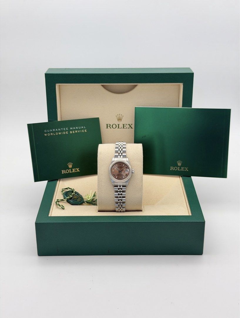 Rolex Datejust 26mm Pink Salmon Arabic Dial (Category: Luxury Watches) located in Manila. Submitted by timelesseleganceph (Listing ID 1440835117, Image 2). Description: Rolex Datejust 26mm Pink Salmon Arabic Dial Reference 69174 Size 26mm Dated Circa U Series 1997-1998 Pink Salmon Arabic Dial in 18k White Gold Fluted Bezel on Jubilee Bracelet Comes with Watch Pouch.