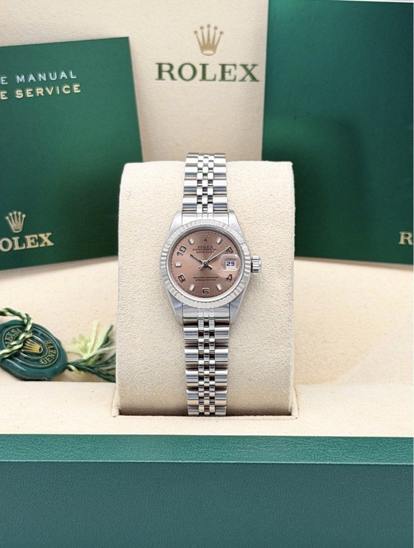 Rolex Datejust 26mm Pink Salmon Arabic Dial (Category: Luxury Watches) located in Manila. Submitted by timelesseleganceph (Listing ID 1440835117, Image 1). Description: Rolex Datejust 26mm Pink Salmon Arabic Dial Reference 69174 Size 26mm Dated Circa U Series 1997-1998 Pink Salmon Arabic Dial in 18k White Gold Fluted Bezel on Jubilee Bracelet Comes with Watch Pouch.