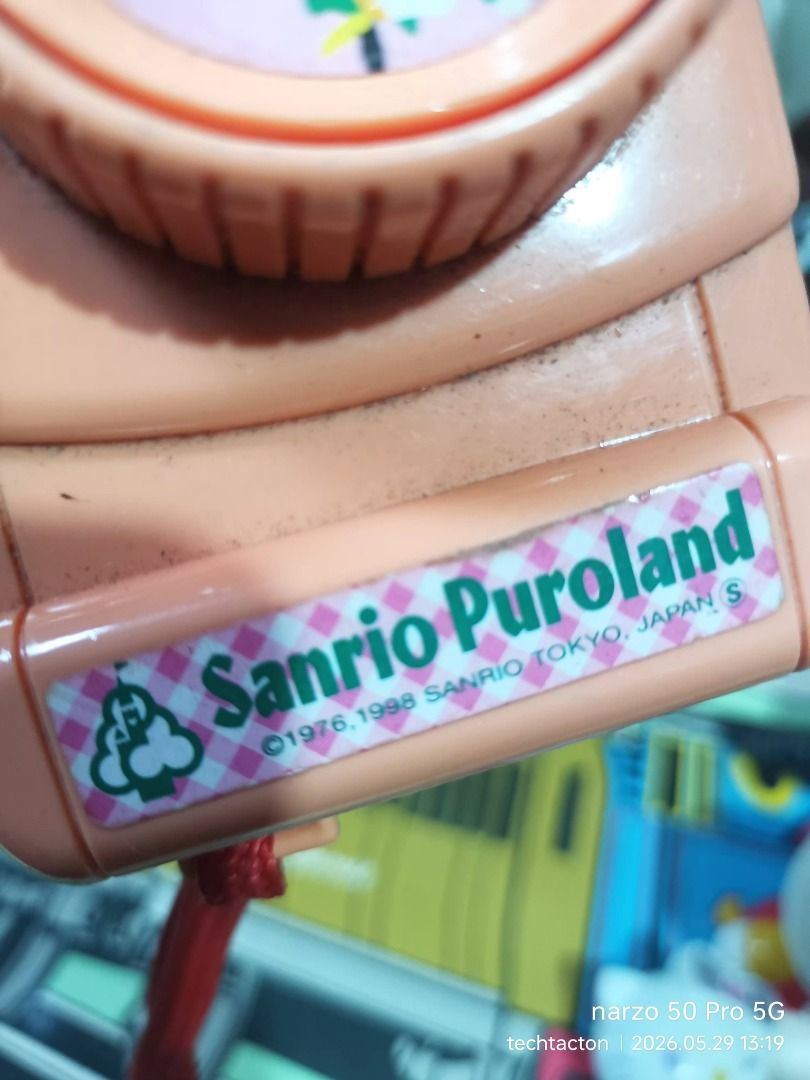 Sanrio Puroland Hello Kitty Toy Camera (Category: Cameras) located in Santo Tomas. Submitted by pickers_corner (Listing ID 1440863563, Image 3). Description: vintage Sanrio Puroland toy camera from 1998 featuring characters like Hello Kitty and Badtz-Maru. view finder working very good condition - Adorable pink toy camera from Sanrio Puroland - Features a cute Kitty figure on top - Unique lens with a character inside when viewed - Ideal for colle
