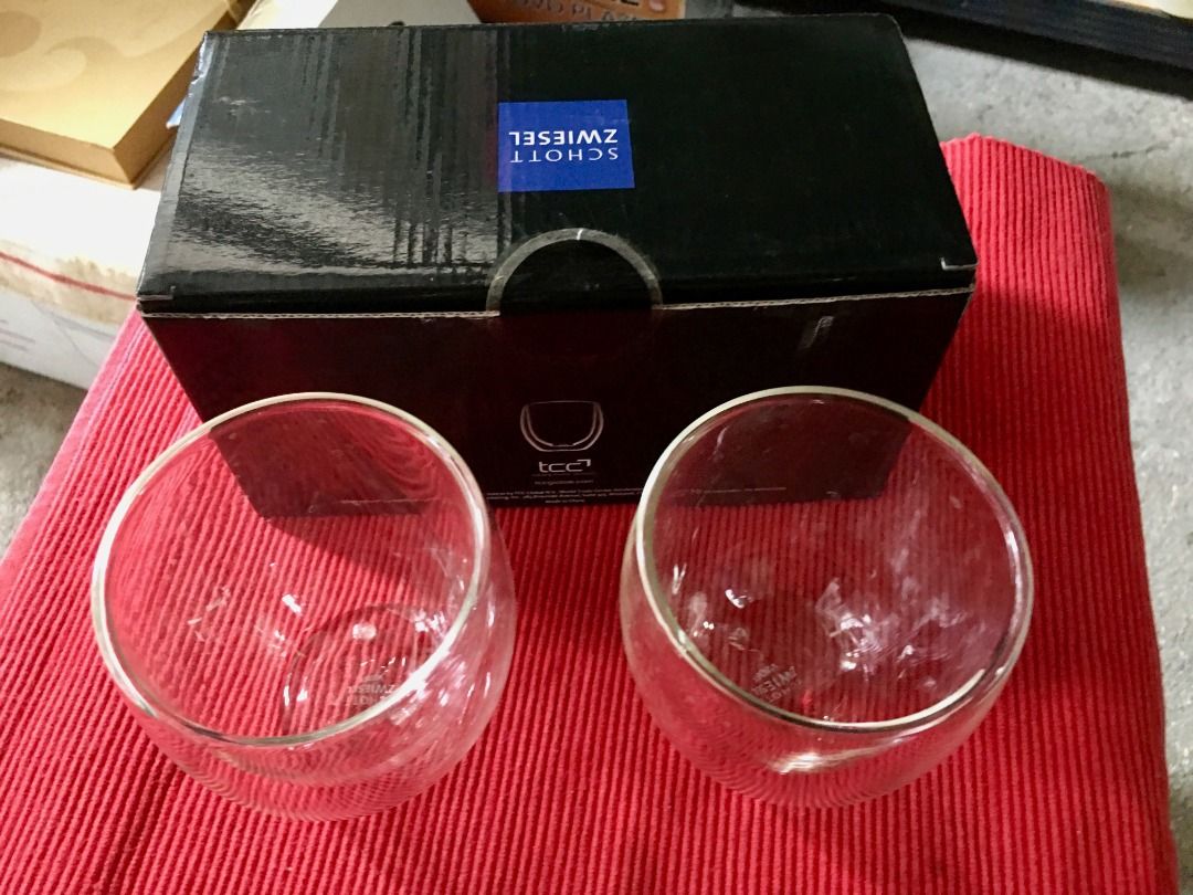 Schott Zwiesel Double Wall Hot & Cold Glasses (Set of 2) (Category: Dinnerware & Cutlery) located in Calamba. Submitted by marjoh29436 (Listing ID 1440887372, Image 3). Description: The brilliant crystal hand made medium glasses with classic and timeless design. Perfect for drinking Bourbon Whisky, Juices, etc. for all special occasions. UNUSED, with box and in excellent condition. (SEE PHOTOS) - Set of 2 Schott Zwiesel double-wall glasses - Idea