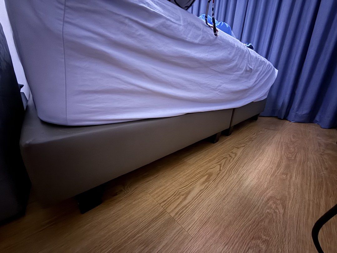Sealy king size bed frame (Category: Bed Frames & Mattresses) located in Singapore. Submitted by selfloved (Listing ID 1440931967, Image 3). Description: - king size sealy bed frame - Upholstered in grey PU leather - Features a tufted headboard - Low profile base with black legs - Fits standard king mattress - Selling due to relocation Bed not included Arrange own transport at sengkang .