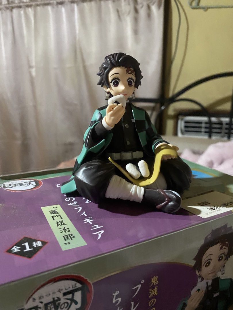 Sega Demon Slayer Tanjiro Kamado Premium Figure (Category: Toys & Games) located in Manila. Submitted by reichii_ (Listing ID 1440914603, Image 2). Description: - Authentic Sega Demon Slayer Tanjiro Kamado figure - Features Tanjiro sitting and holding a rice ball - Original box included - Ideal collectible for any Demon Slayer enthusiast - Pickup or meet up options available.