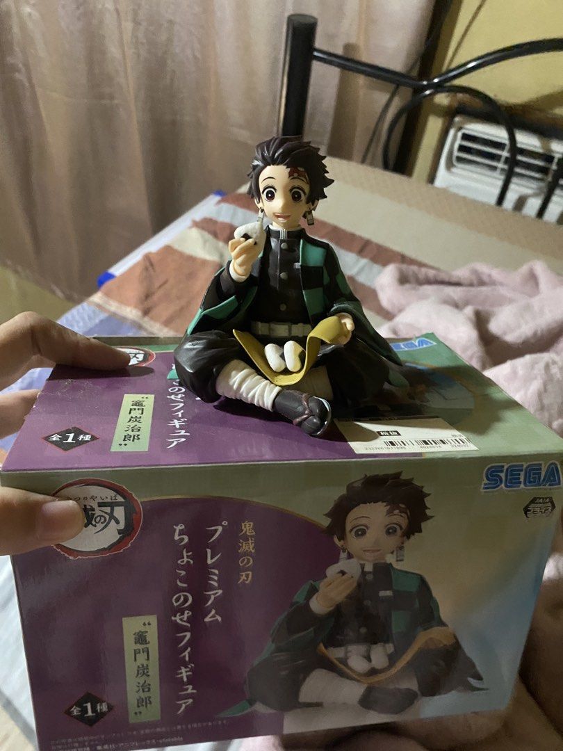 Sega Demon Slayer Tanjiro Kamado Premium Figure (Category: Toys & Games) located in Manila. Submitted by reichii_ (Listing ID 1440914603, Image 1). Description: - Authentic Sega Demon Slayer Tanjiro Kamado figure - Features Tanjiro sitting and holding a rice ball - Original box included - Ideal collectible for any Demon Slayer enthusiast - Pickup or meet up options available.
