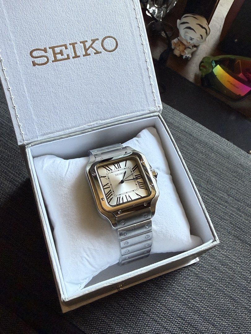 Seiko Santos Mod (Category: Men's Watches) located in Quezon City. Submitted by bradd09 (Listing ID 1440807177, Image 2). Description: Seiko Santos Mod Inclusions: Unit and box Specs: - sapphire crystal dome - 38mm - Seiko NH35 movement - green lume - date function Quezon City meetup only or via shipping (payment first via lalamove or COD LBC) Message me for inquiries or your preferred designs.