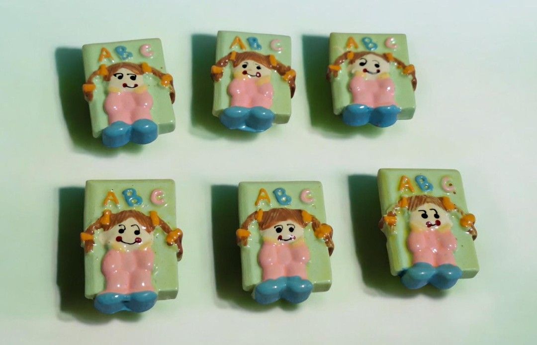 Set of 6 Cute Girl with ABC Book Miniatures (Category: Craft Supplies & Tools) located in Valenzuela. Submitted by pixieworks64309 (Listing ID 1440759829, Image 1). Description: - Set of 6 adorable miniature figurines - Features cute girl characters - Each girl holds a book with 'ABC' on it - All have pigtails - Wearing pink outfits with blue shoes - Ideal for crafts, dioramas, or collecting - Unique little pieces.