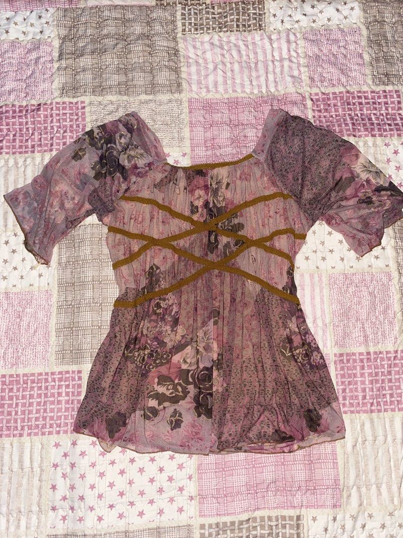 Sheer Floral Print Puff Sleeve Top (Category: Blouses) located in Davao. Submitted by irisdy (Listing ID 1440919031, Image 1). Description: - Sheer floral print top - Short puff sleeves - Square neckline - Criss-cross ribbon detail on bodice - Lightweight and flowy fabric - Versatile for layering or solo wear.