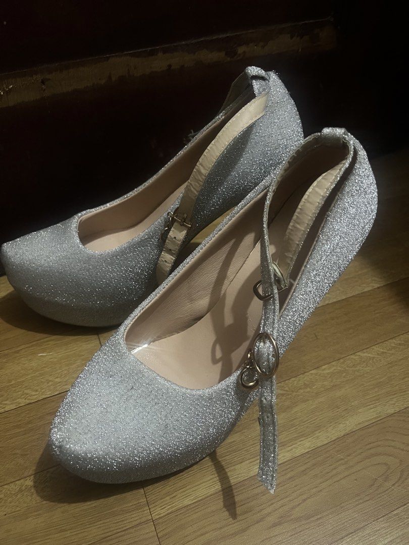 Sparkly Silver Platform Heels with Ankle Strap (Category: Heels) located in Santa Rosa. Submitted by mo0chimi (Listing ID 1440892700, Image 2). Description: - silver glitter heels - tried only once, never been used. good as new.