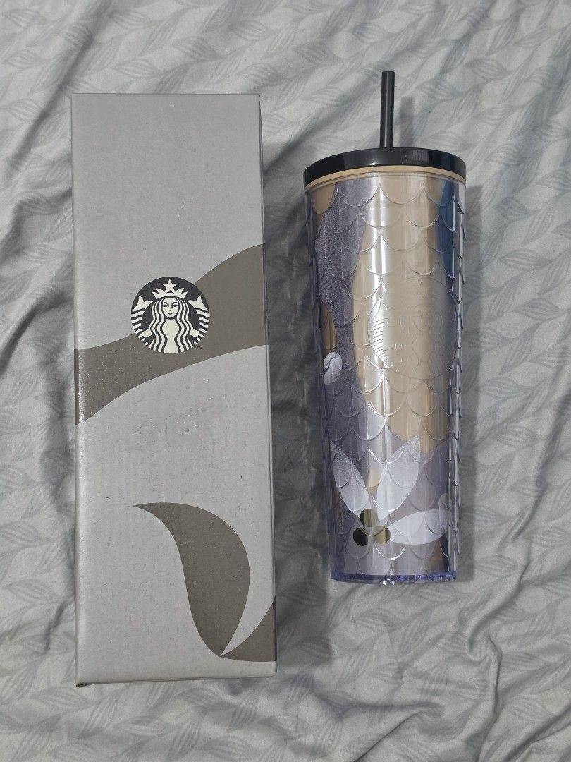 Starbucks Tumbler with Box (Category: Water Bottles & Tumblers) located in Binan City. Submitted by nel.geronimo (Listing ID 1440783955, Image 2). Description: - Authentic Starbucks Tumbler - Unique textured design in purple and gold - Comes with original box - Includes black straw - Ideal for your everyday beverages.