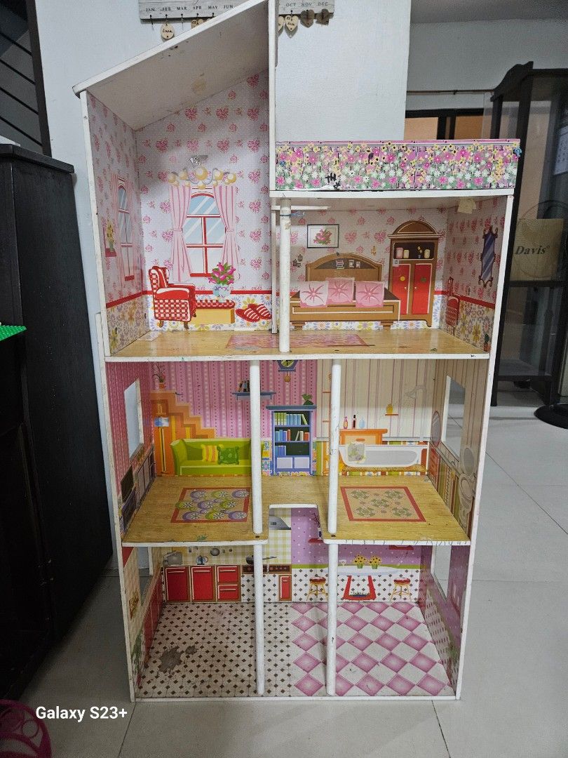 Super sale!Plum Tillington Large Wooden Dollhouse with Furniture (Category: Toys & Games) located in Quezon City. Submitted by all200andbelow (Listing ID 1440870529, Image 3). Description: - as is condition. pickup at commonwealth ave qc. or lalamove van -Spacious dollhouse with multiple rooms and levels. - Includes built-in furniture: beds, bathtub, kitchen cabinets. - Adorable pink and floral wallpaper decoration. - Features stairs and balconie