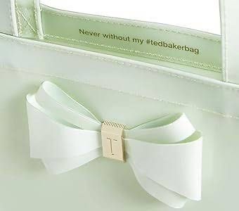 Ted Baker Alacon Plain Bow Large Icon Tote / Top handle Bag (Category: Luxury Bags & Wallets) located in Muntinlupa City. Submitted by secondemain.ph (Listing ID 1440812372, Image 3). Description: •Mint Green Color •Glossy PVC Material •Gold-tone hardware •36cm L x 9cm W x 37cm H •Top handle with 20cm drop •Refer to photos 5 onward for actual photos of item on hand •RFS: downsizing AUTHENTICITY GUARANTEED I only sell authentic products from verif